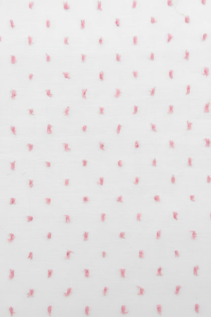 White Fabric with Pink Swiss Dot